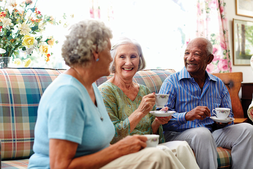 Happy senior people having coffee in nursing home Benefits Of Independent Living In Hope, IN