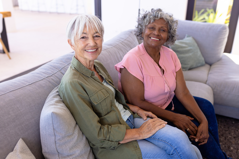 Portrait of smiling multiracial senior female friends sitting on Senior Health: How The Urban Design In Columbus, IN Improves Your Well-Being
