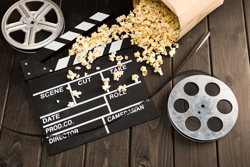 Popcorn and movie clapper board