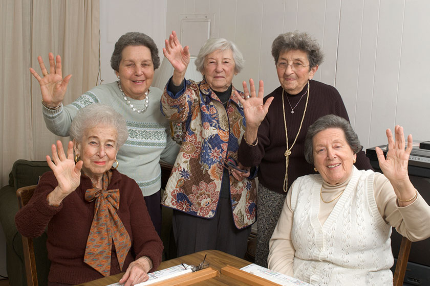 Senior women at the game table