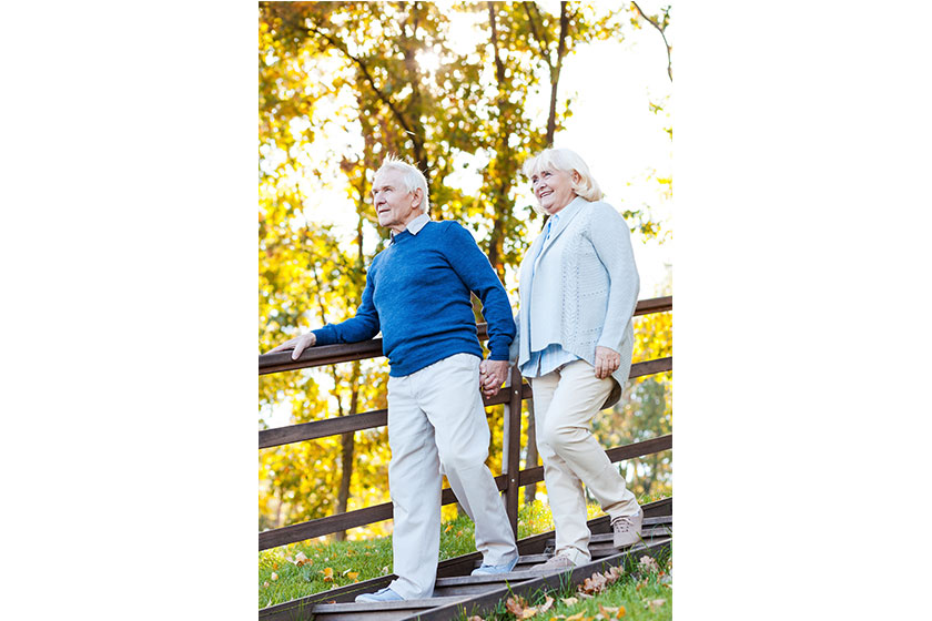 Happy senior couple moving down Happy senior couple moving down